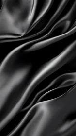 Black satin folds with glossy highlights in soft waves.