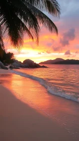 Tropical beach sunset with glowing surf reflections.