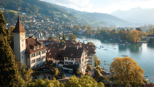 Lakeside clock tower town basking in mellow alpine sunlight.