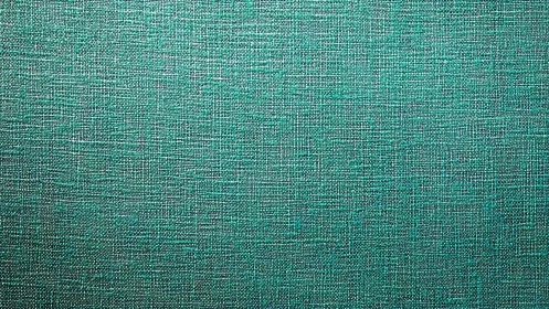 Emerald woven tapestry of textured teal threads in close view.