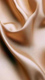 Golden satin folds in softly undulating close-up study.