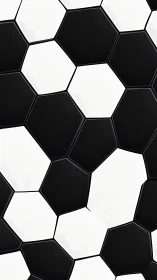 Geometric closeup of a classic black and white soccer ball.