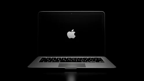 Minimalist laptop product render with central luminous logo.