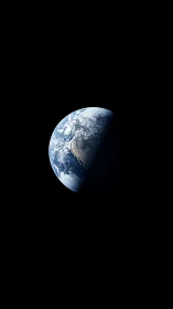 Gentle blue Earth rising quietly in the vast dark of space.