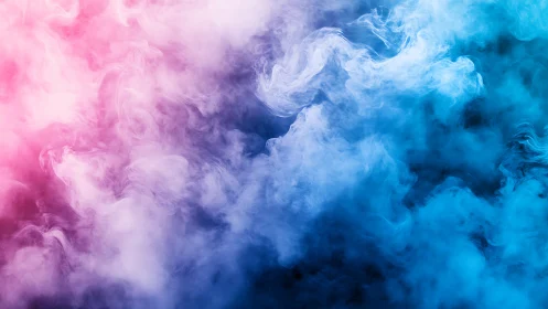 Dreamy pink and blue swirling clouds of gentle color.