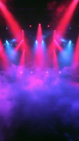 Vibrant stage spotlights over dense pink and blue fog.