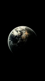 Terminator line divides illuminated Earth hemisphere in space