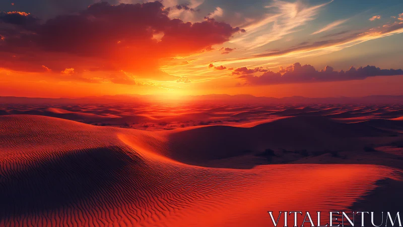 Sunset light over patterned desert dunes and cloud layers.