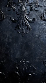 Dark baroque ornament glows on textured black surface.