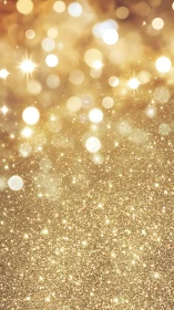 Golden glitter bokeh background with radiant festive light.