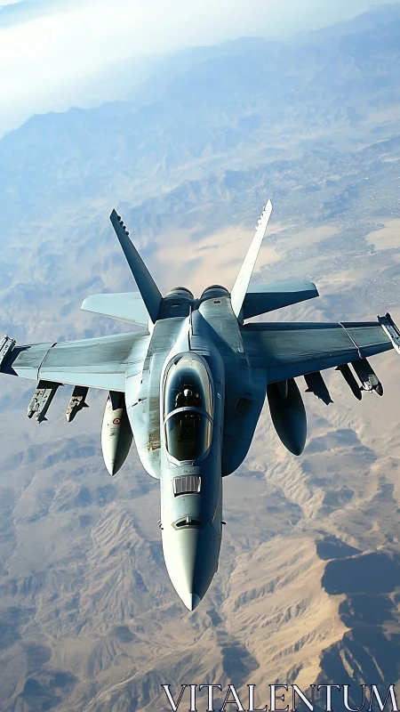 Jet warrior skims the desert mountains in silent precision