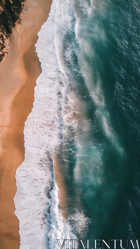 Aerial shoreline study with turquoise surf and golden sand.