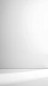 Minimalist white interior wall with soft directional daylight