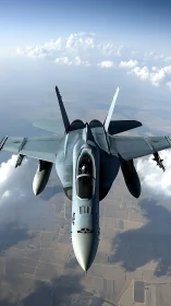 Modern fighter jet cuts through bright high-altitude clouds