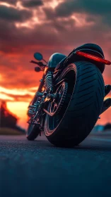 Sunset motorcycle waits on an open road for the next ride.