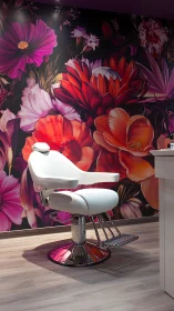 White hydraulic salon chair against oversized floral wall mural