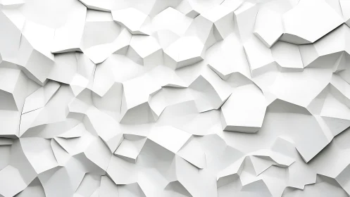 White faceted geometric wall with sharp folded planes.