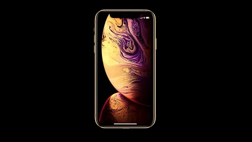 iPhone XS Max displaying liquid gold and purple digital wallpaper design.
