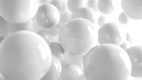 Glossy white spheres in soft high key volumetric lighting