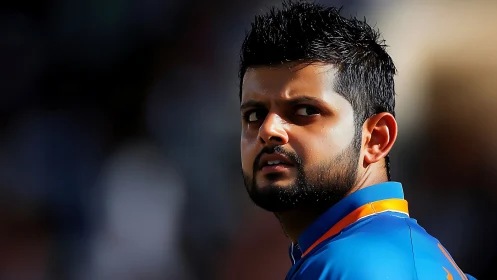 Side-lit athlete portrait with high contrast facial focus.