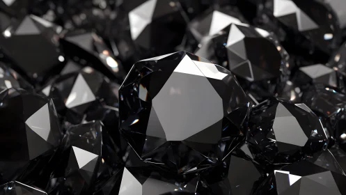 Close-up view of multiple glossy faceted black diamonds.