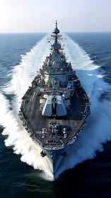 Majestic warship carving bold white paths through sea foam.