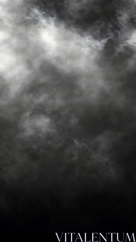 Dense grayscale cloud texture with diffuse light gradient.