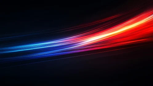 Vibrant red and blue light streaks on dark abstract background.