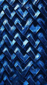 Textured blue chevron relief pattern in sculpted 3D surface.