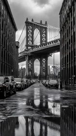 Monochrome urban bridge corridor with reflective wet street.