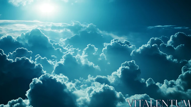 Sunlit cumulonimbus cloudscape in dramatic cyan atmosphere.