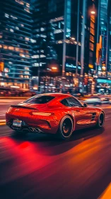 Red sports coupe moves through illuminated urban corridor