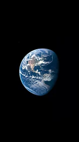 Earth limb in deep space with cloud bands and ocean details