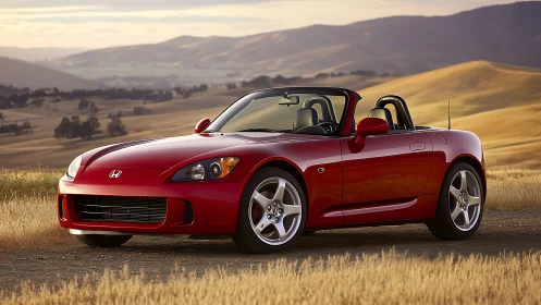 Red convertible sports car parked on rural roadside at dusk.