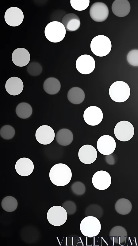Defocused white circular light spots on dark background.