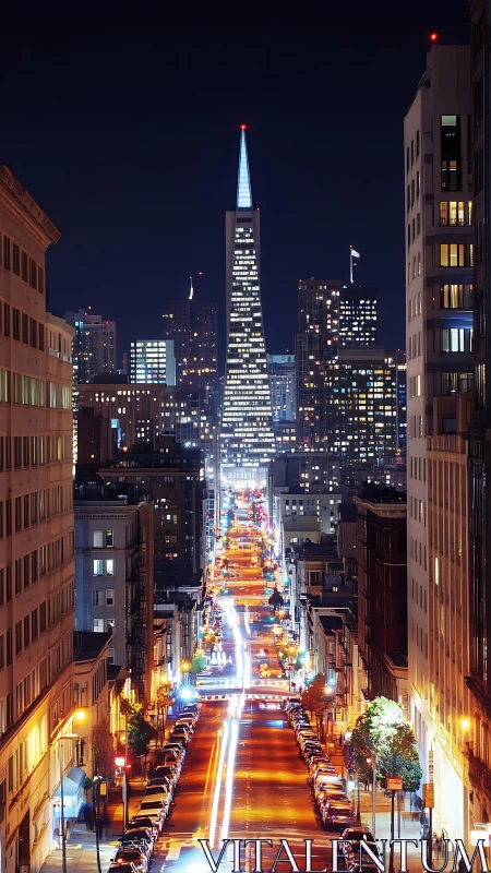 Transamerica Pyramid dominates night view above lit street