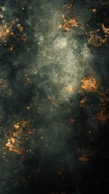 Dark textured surface with dispersed rustlike orange patches.