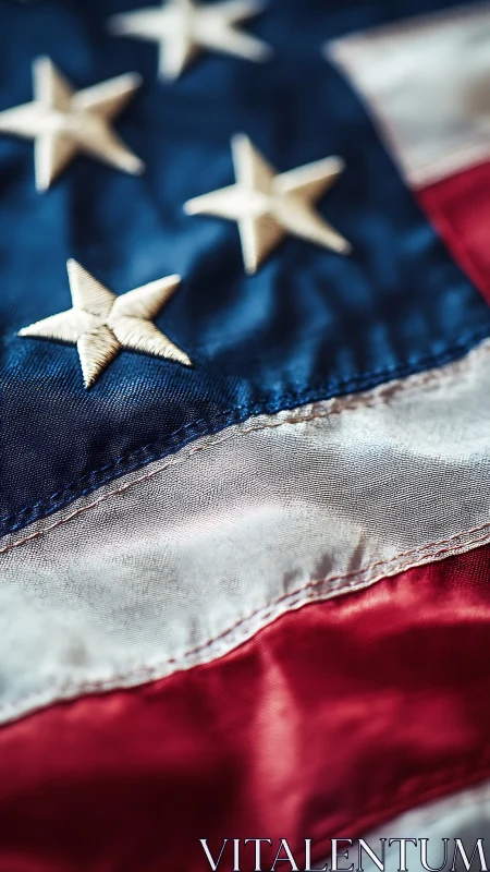 Close view shows embroidered stars on rippled US flag