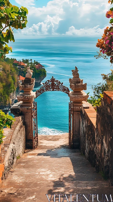 Clifftop temple gate frames turquoise tropical ocean view.