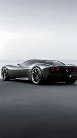 Black sports coupe is parked on a flat coastal roadway