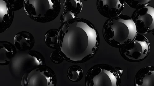Glossy black reflective spheres float against dark background