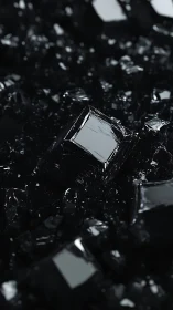 Gleaming black crystal cubes emerge from a dark abstract field