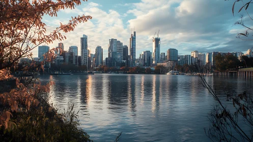 Photorealistic riverfront skyline with autumnal foreground framing.