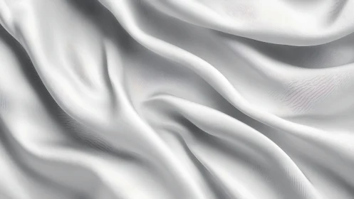 White silk fabric folds catch soft diffused studio light