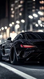 Midnight sports car glides through glowing city streets