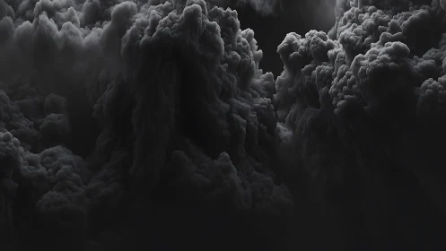 Dense dark storm clouds form towering sculpted masses