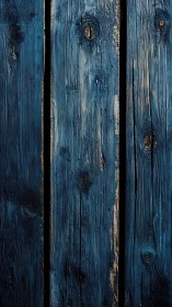 Weathered blue wooden planks with textured grain detail.