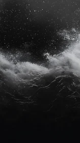 Starlit surf collides with midnight depths in monochrome roar