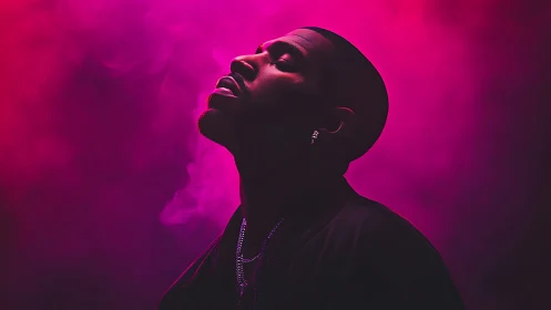 Moody portrait captures calm strength in neon magenta haze