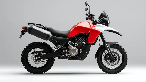 Side-profile adventure motorcycle with off-road knobby tires.